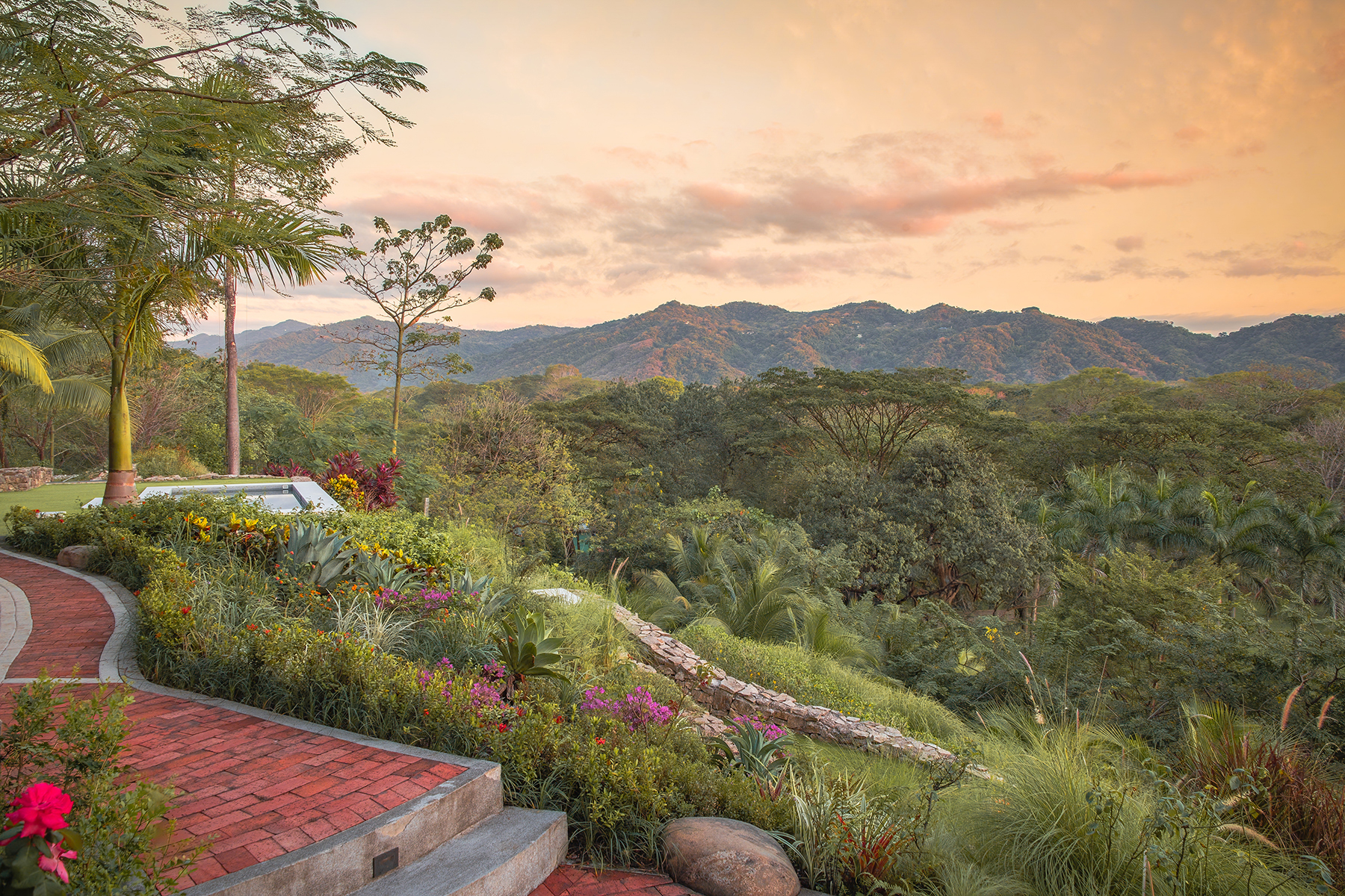 Landscaped gardens at The Sanctuary Estate with mountain views, Nosara, Costa Rica