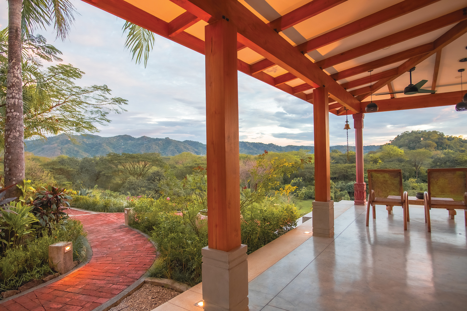 covered terrace brick walkway — The Sanctuary Estate, Nosara, Costa Rica