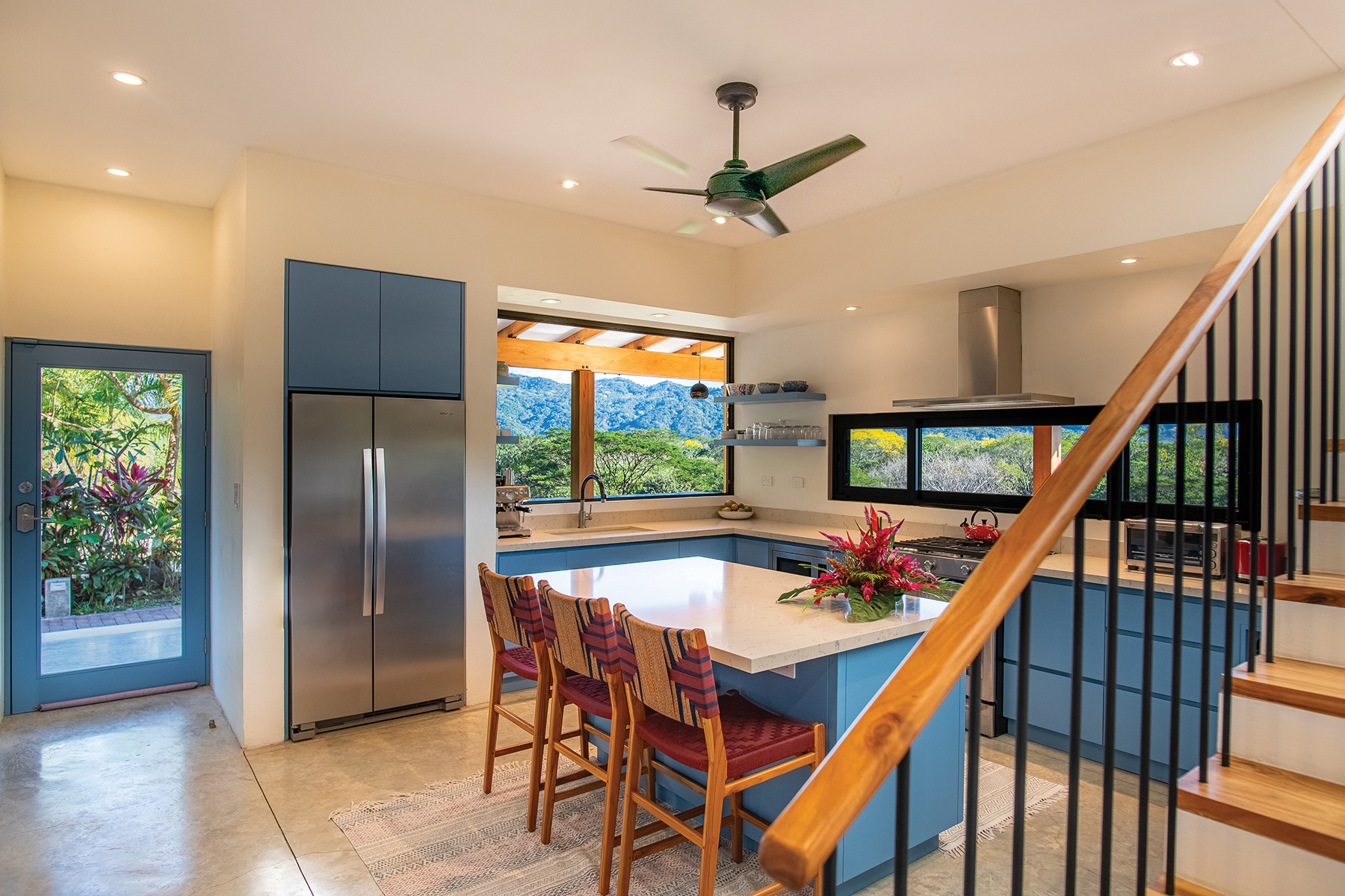 kitchen island and mountain view — The Sanctuary Estate, Nosara, Costa Rica