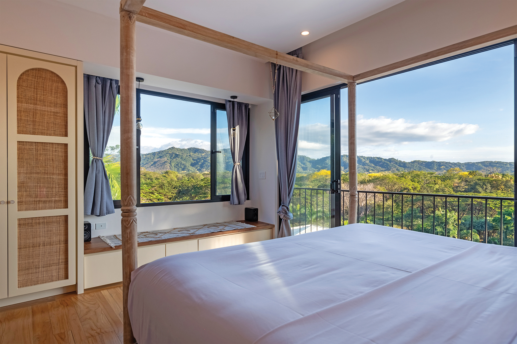 bedroom four poster window seat — The Sanctuary Estate, Nosara, Costa Rica