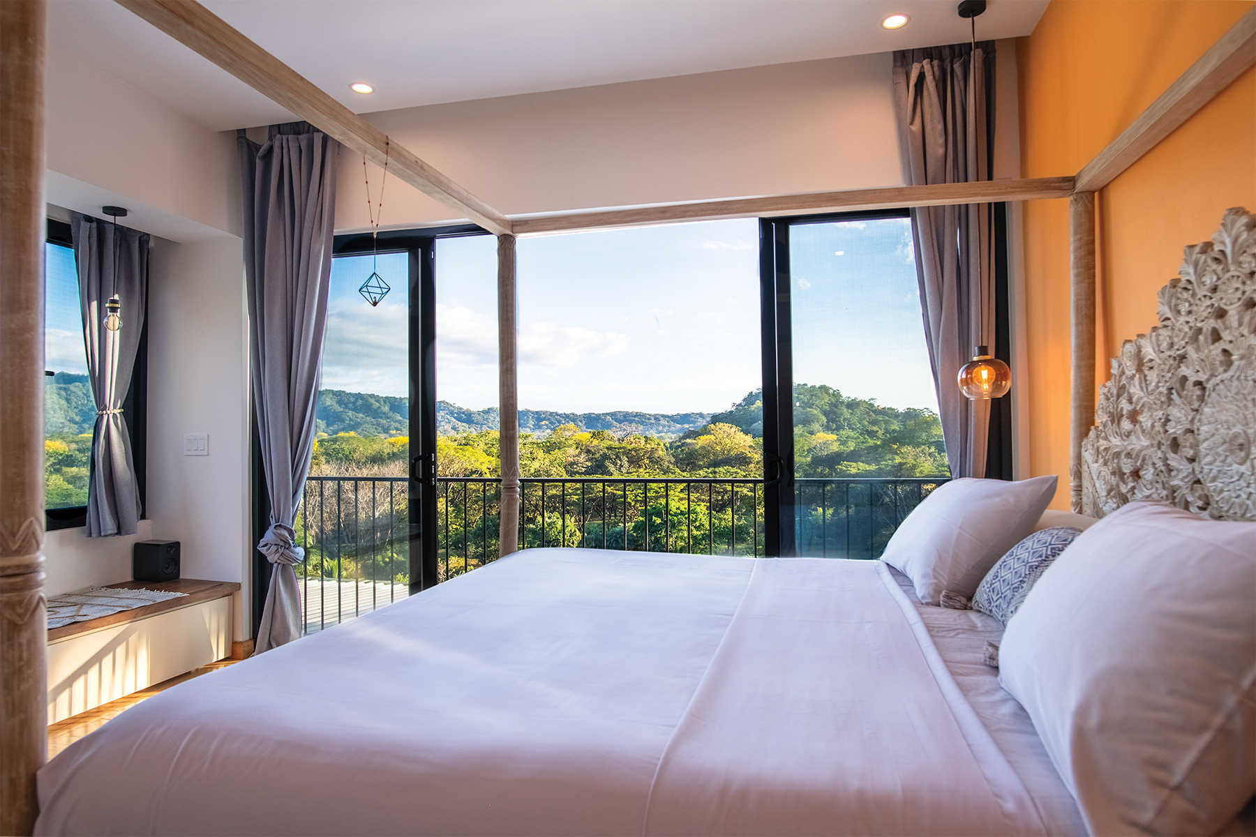 orange bedroom with valley view — The Sanctuary Estate, Nosara, Costa Rica