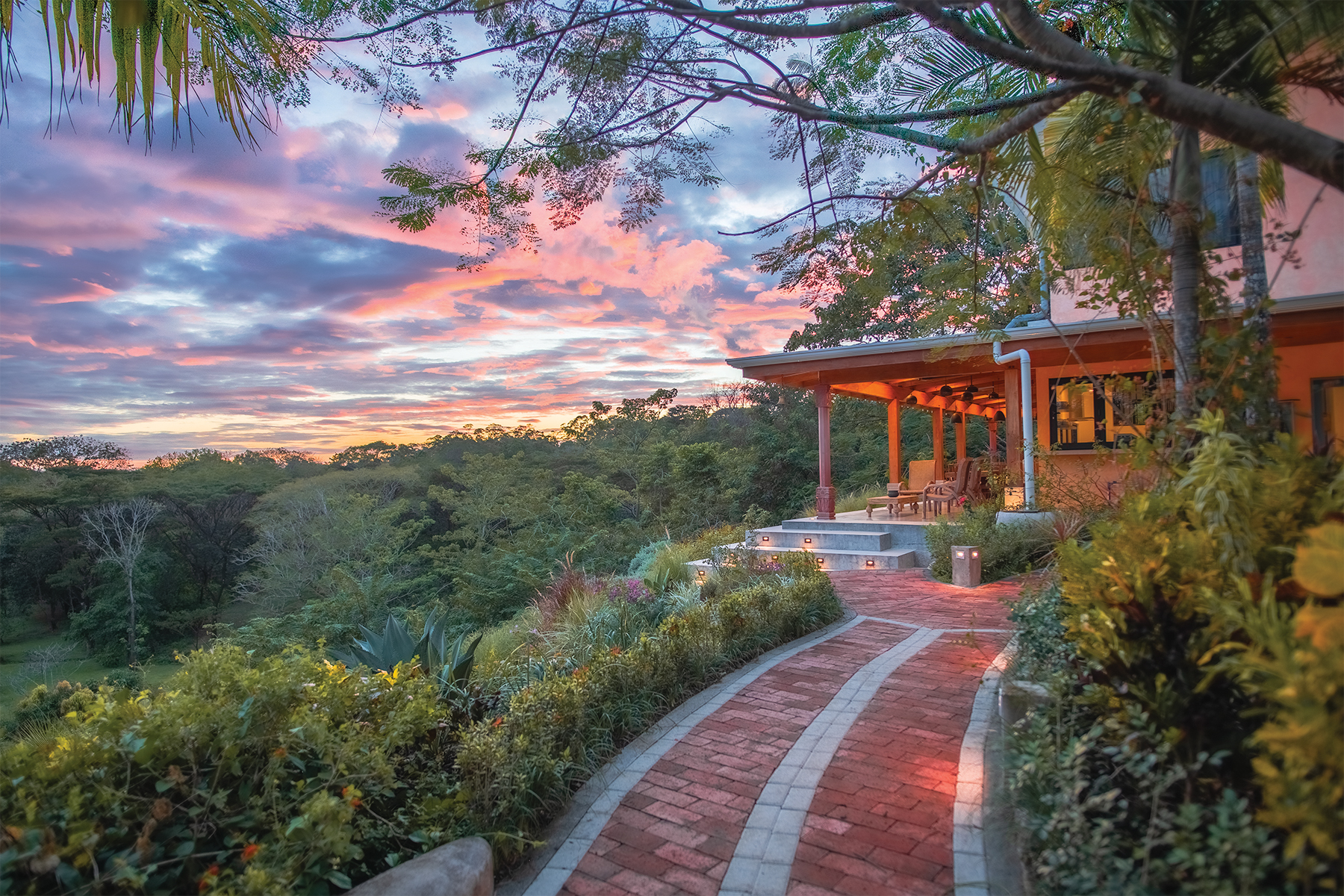 garden path to residence sunset — The Sanctuary Estate, Nosara, Costa Rica