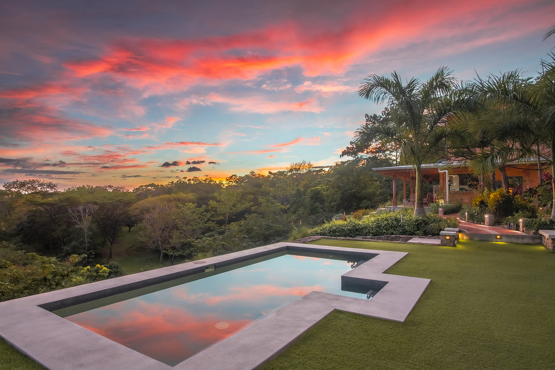 The two-bedroom residence and veranda at sunset, The Sanctuary Estate, Nosara, Costa Rica