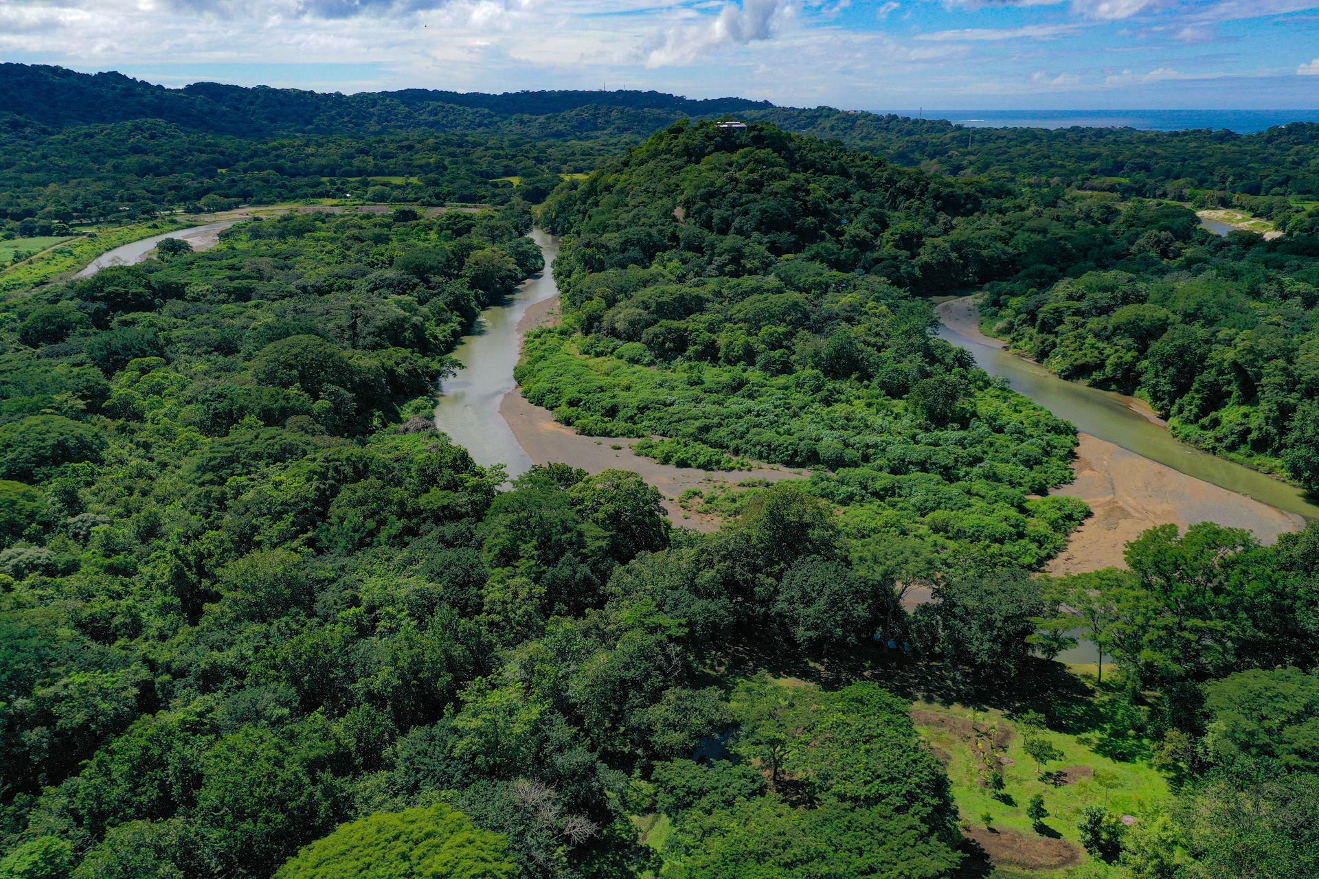 Nosara river aerial forested corridor — The Sanctuary Estate, Nosara, Costa Rica